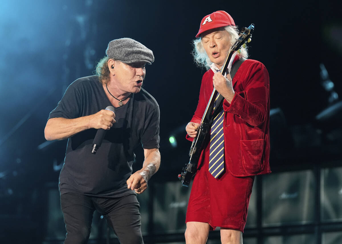 Brian Johnson, left, and Angus Young of AC/DC perform on Friday, April 18, 2025, at Rose Bowl S ...