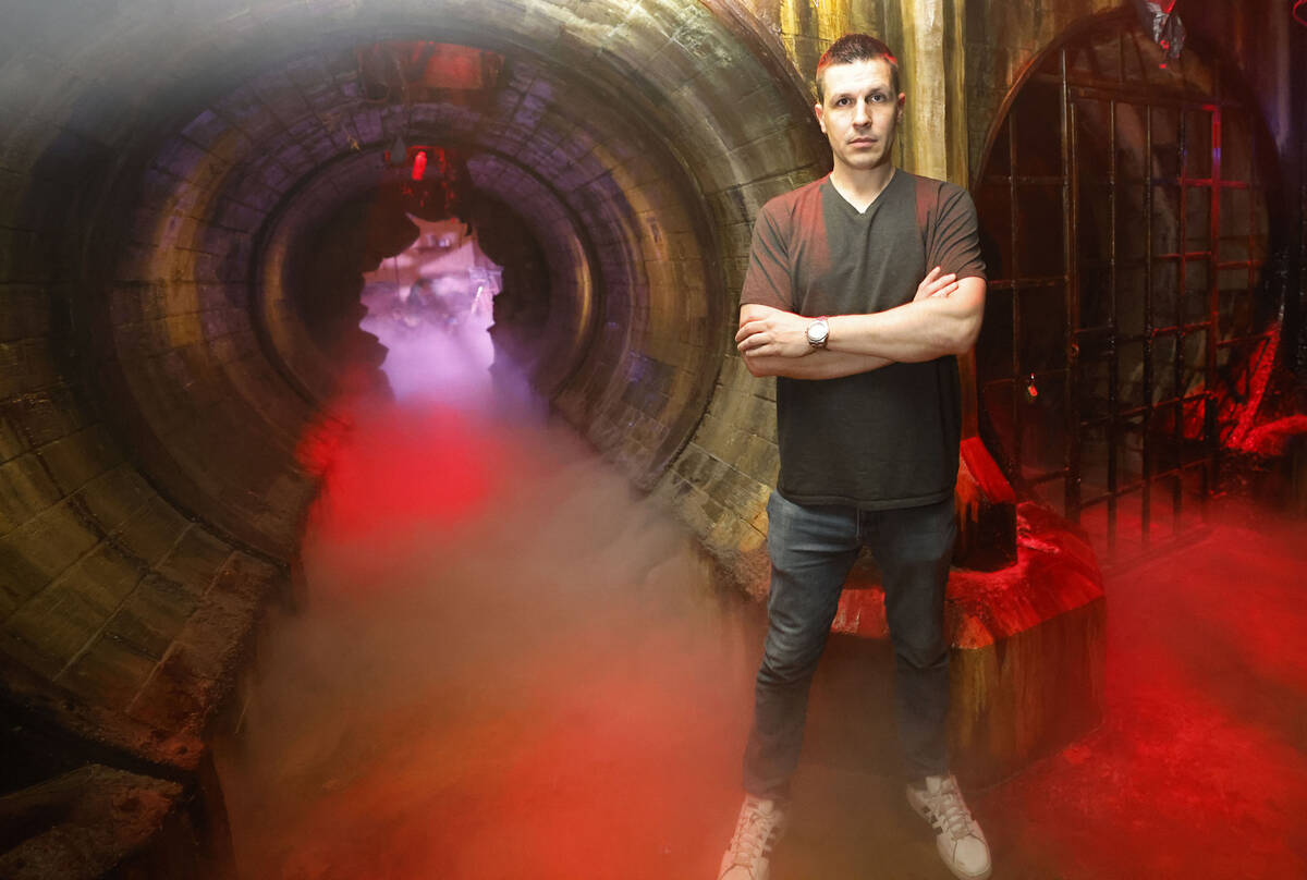 Escape IT Owner/Creator Jason Egan poses for a photo on the set of a sewer tunnel at Escape IT, ...