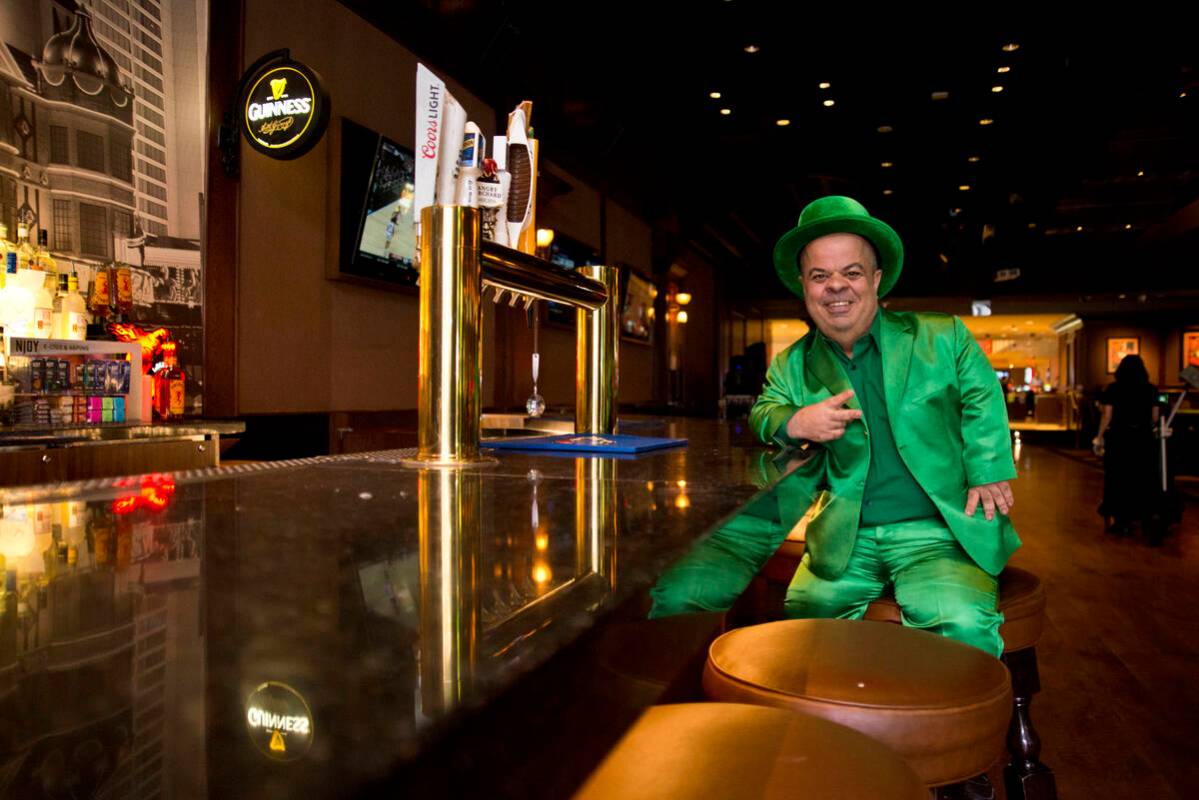 Brian Thomas, O’Sheas Casino manager and resident leprechaun, poses for a photograph insi ...
