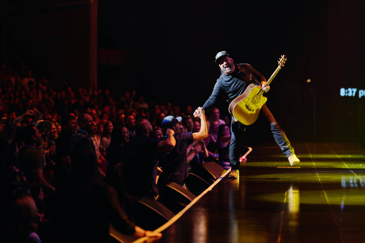 Garth Brooks is shown in his “Garth Brooks/Plus One” opener at the Colosseum at Cae ...