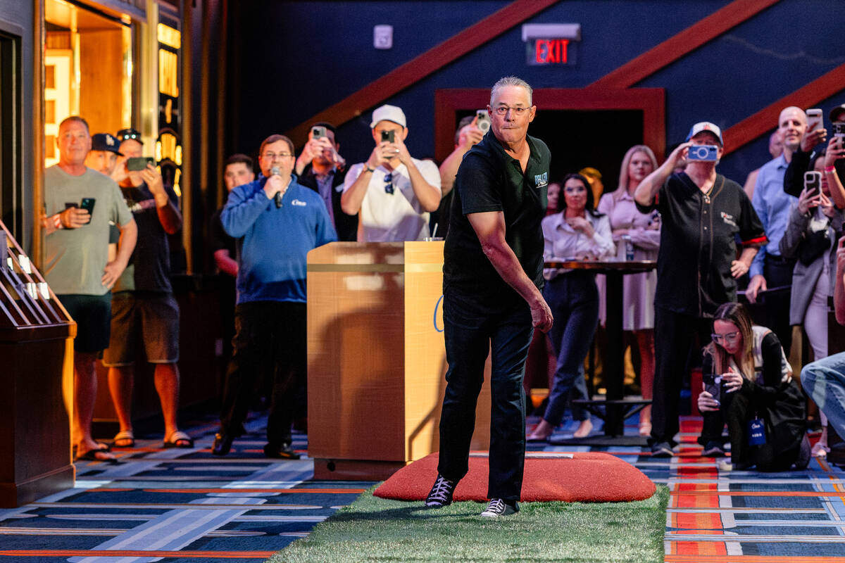 Former Major League great and Las Vegas native Greg Maddux throws out the first pitch at the th ...