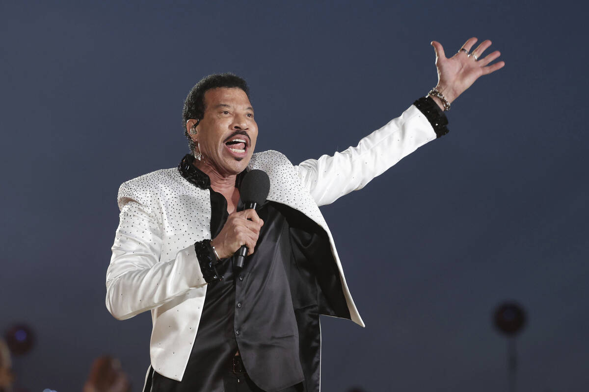 US singer Lionel Richie performs during a concert at Windsor Castle in Windsor, England, Sunday ...