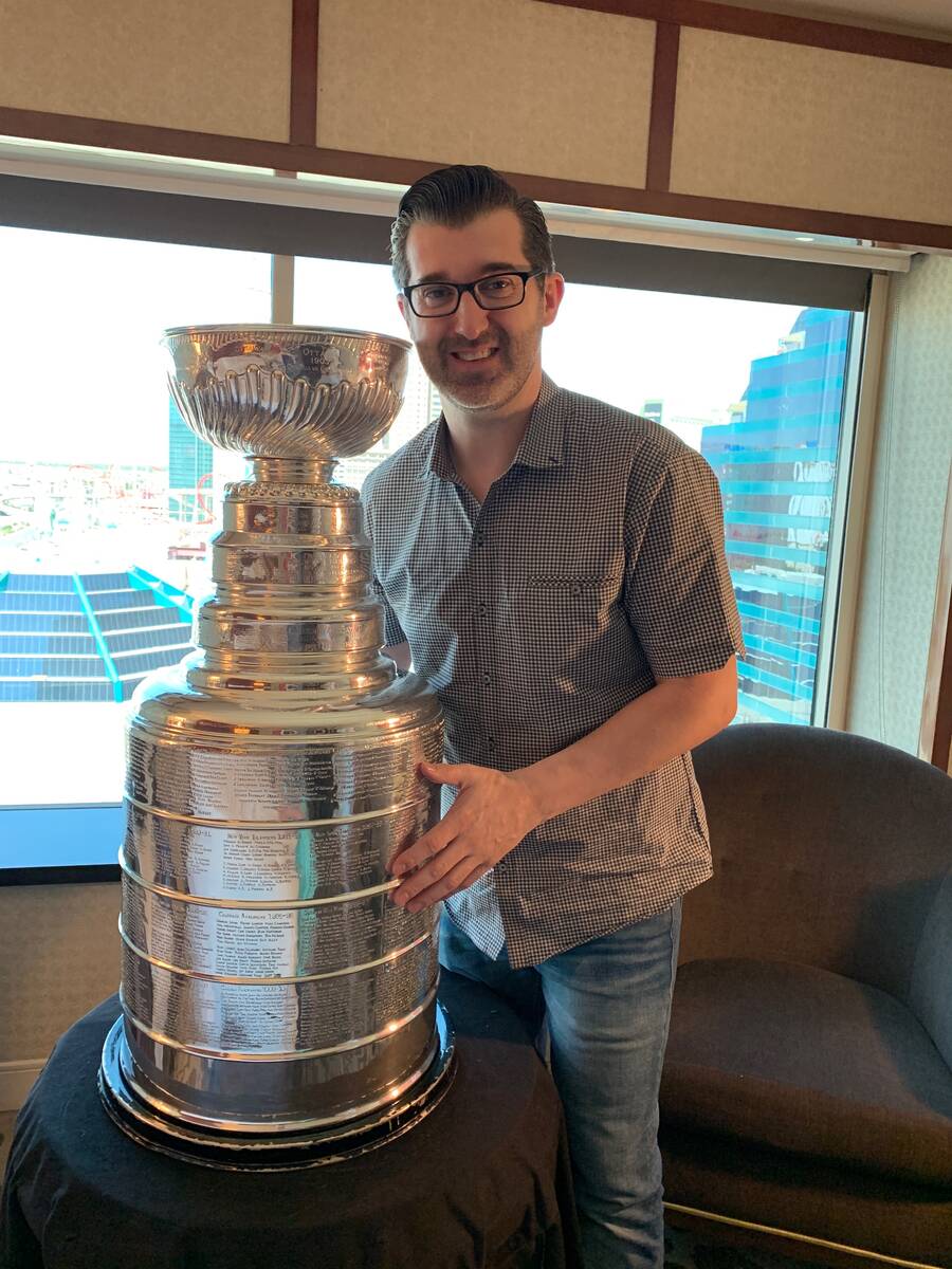 Las Vegas comedy hypnotist Marc Savard is shown with the Stanley Cup at MGM Grand during the NH ...