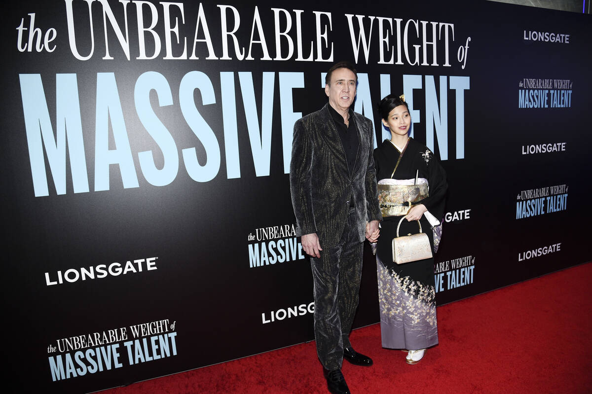 Actor Nicolas Cage, left, and wife Riko Shibata attend the special screening of "The Unbea ...