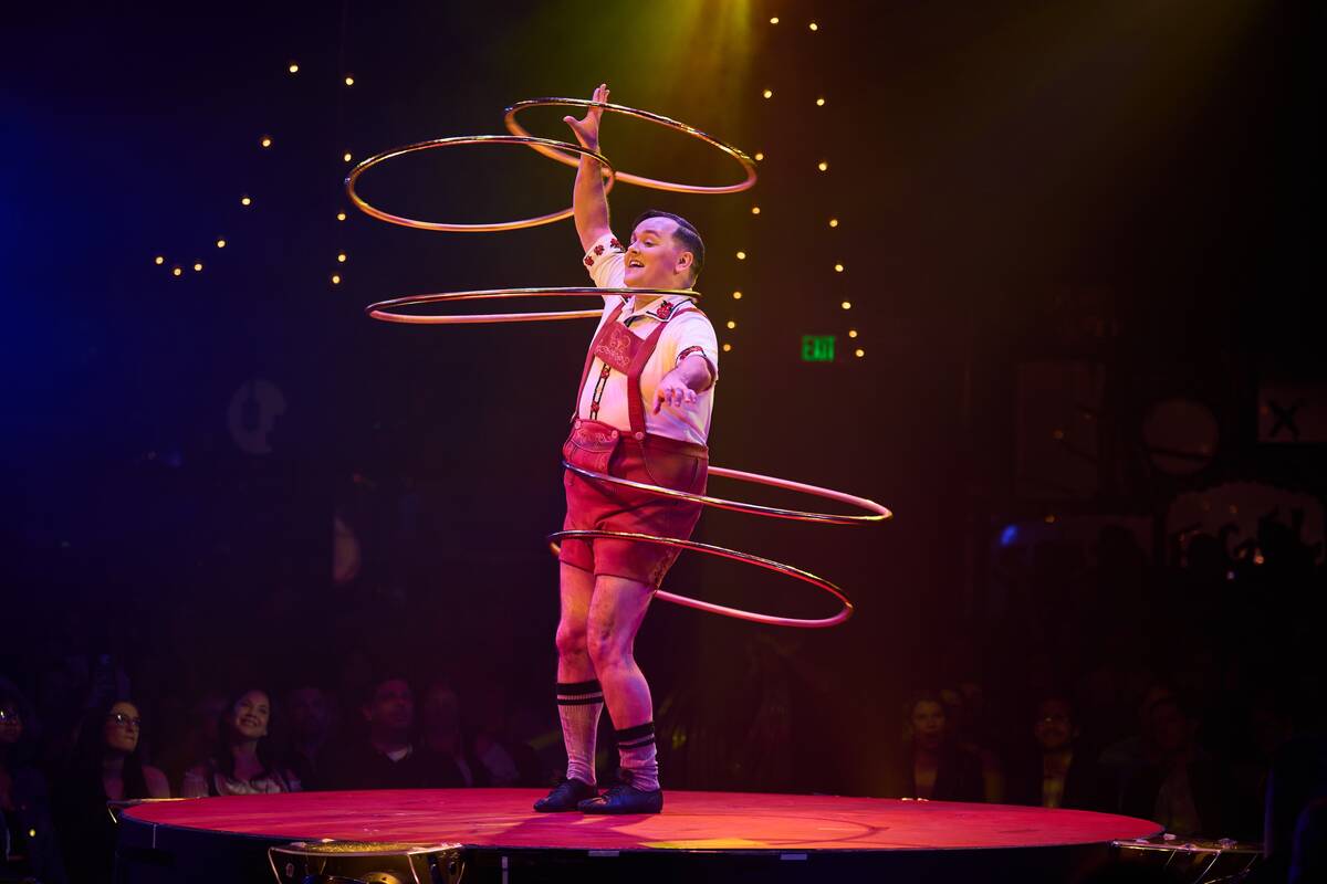 Craig Reid performs his hula-hoop act during Absinthe’s 14th Anniversary performance, Apr ...