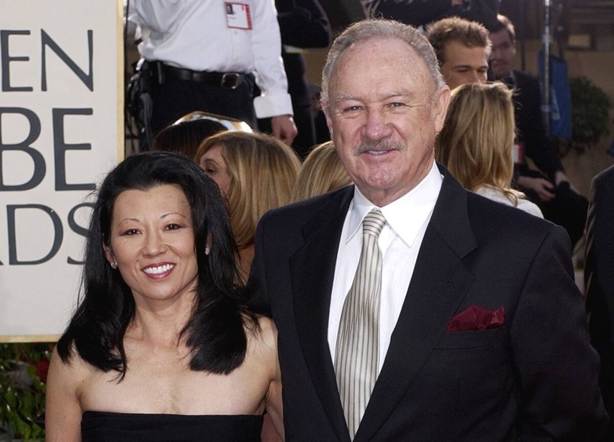 Actor Gene Hackman arrives with his wife, Betsy Arakawa, for the 60th Annual Golden Globe Award ...