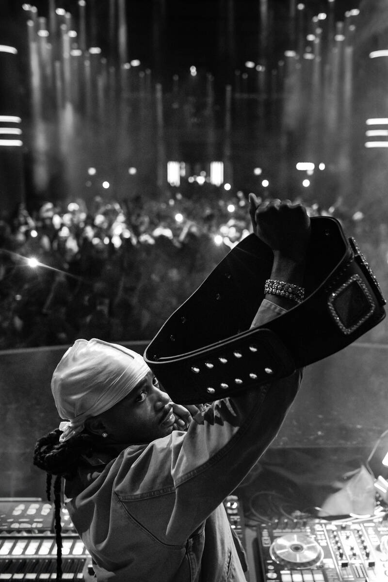 Metro Boomin holds a WWE title belt during “WrestleMania After Dark” at LIV Nightcl ...