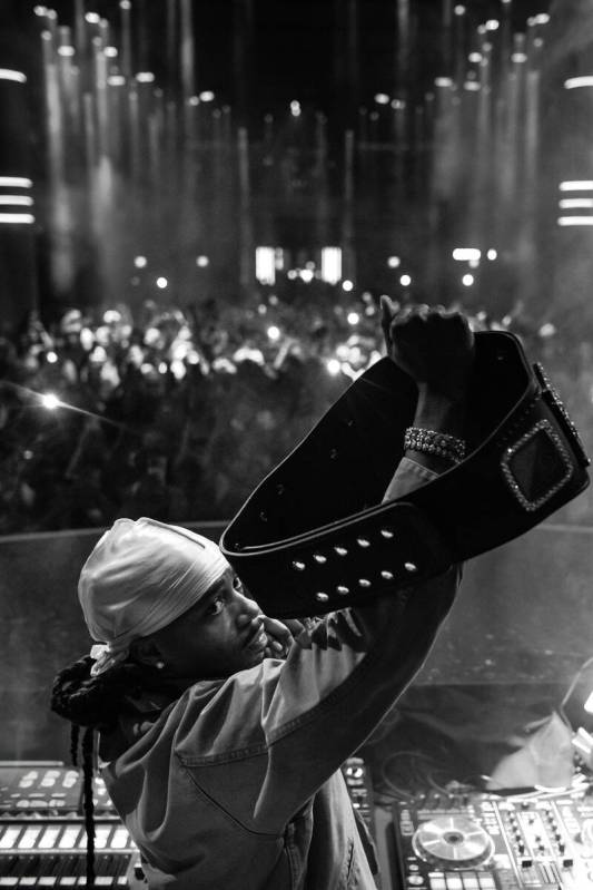 Metro Boomin holds a WWE title belt during “WrestleMania After Dark” at LIV Nightcl ...