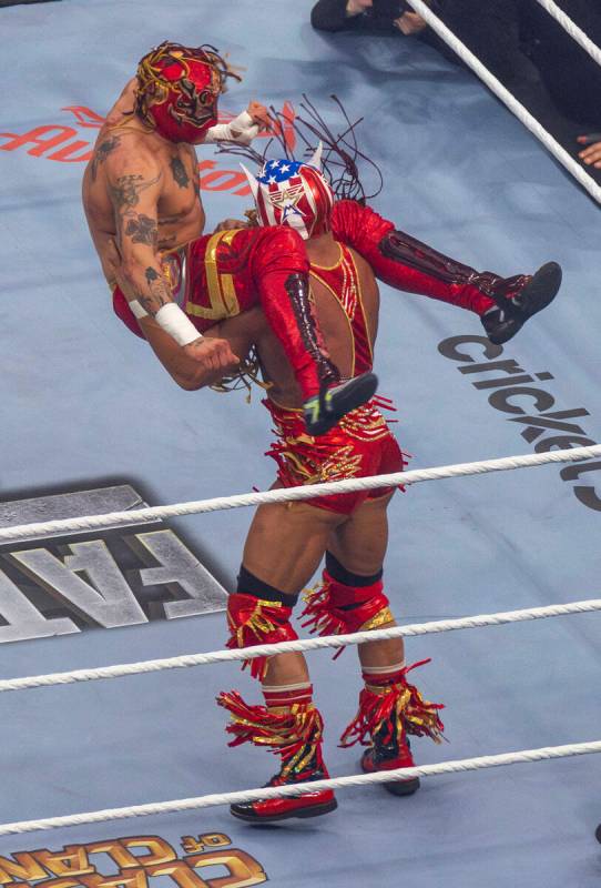 Rey Fenix is ready to be slammed down by El Grande Americano in their match during WrestleMania ...