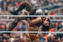 Bianca Belair tosses Rhea Ripley during WWE WrestleMania 41 at Allegiant Stadium Sunday, April ...