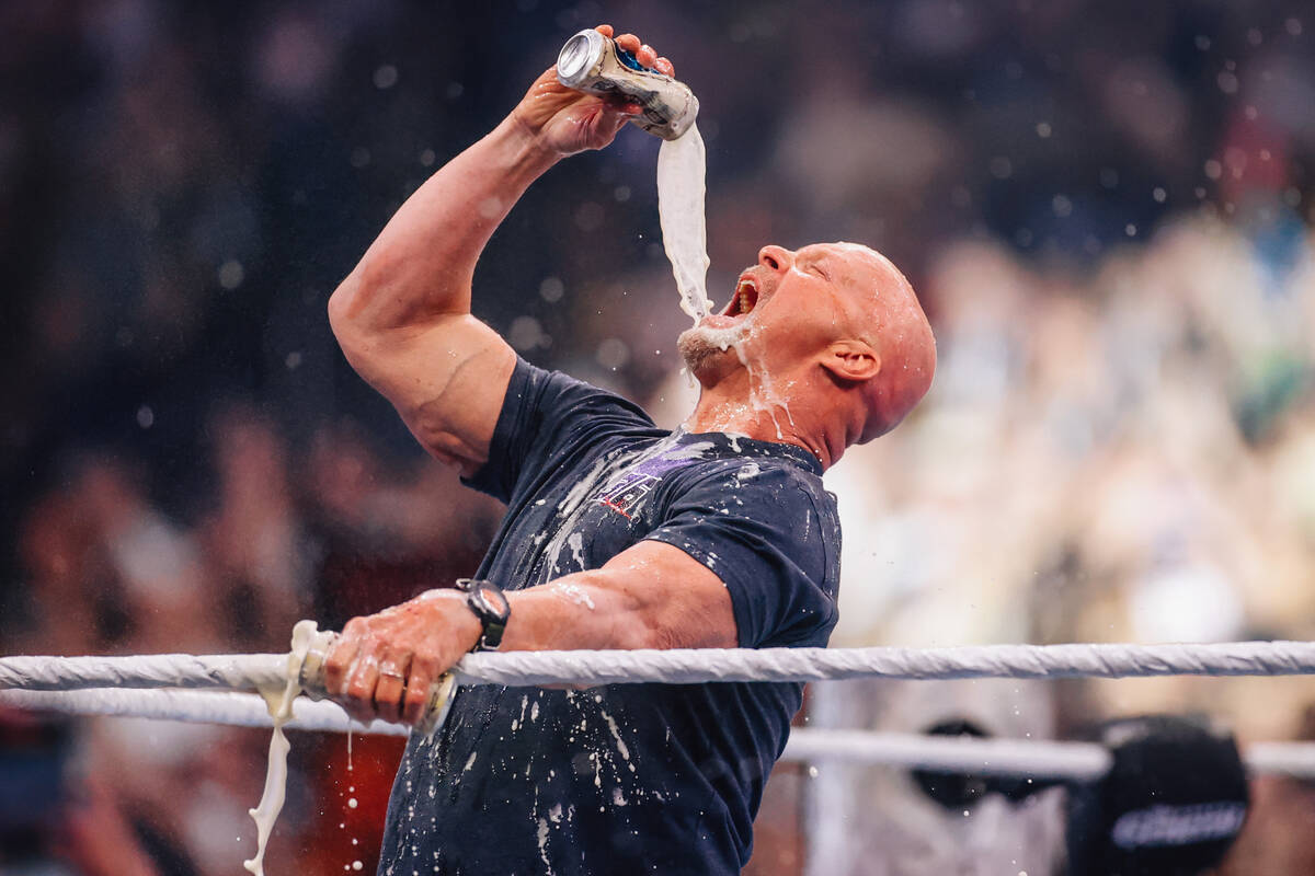 Steve Austin downs a beer during WWE WrestleMania 41 at Allegiant Stadium Sunday, April 20, 202 ...