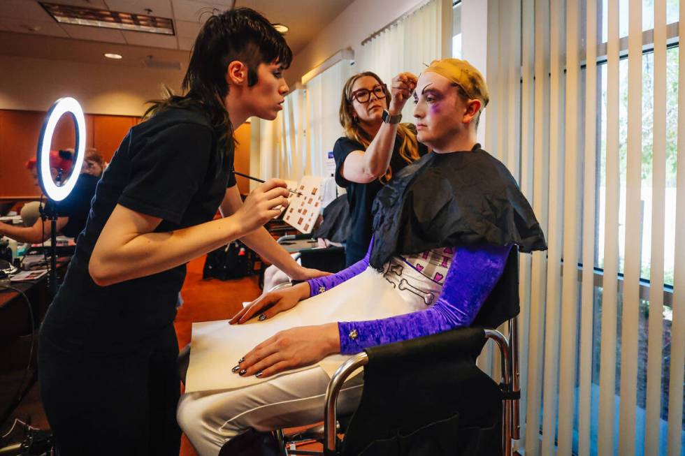 Zack Kushubar, who performs as Captain Hook, gets his makeup done before a dress rehearsal for ...