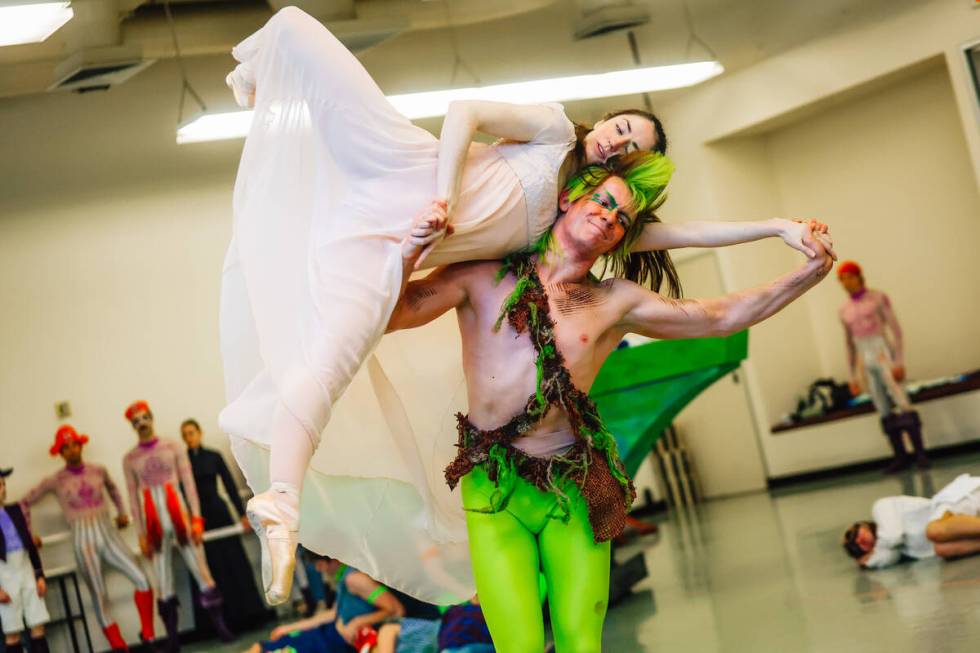 Jack Grohmann, bottom, lifts up Emma McGirr during a dress rehearsal for “Peter Pan&#x20 ...