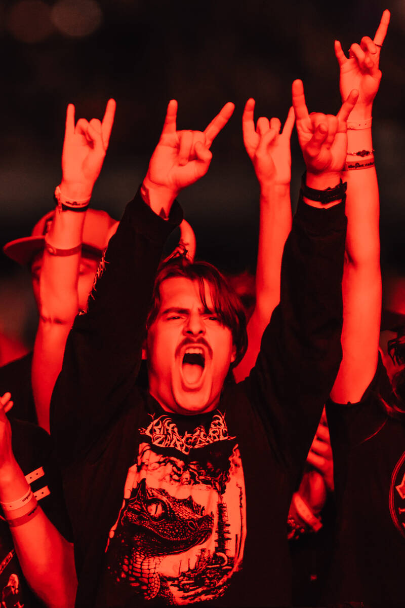A fan cheers as AC/DC performs during their “Power Up” tour stop at Allegiant Sta ...