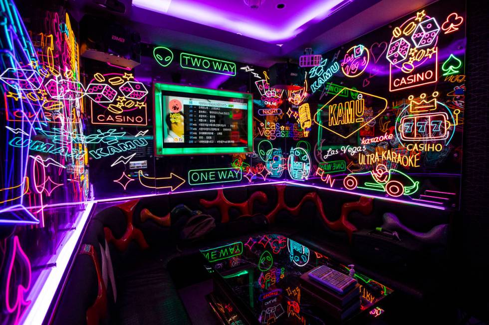 A room filled with neon signs at Kamu Karaoke at the Grand Canal Shoppes at The Venetian in Las ...