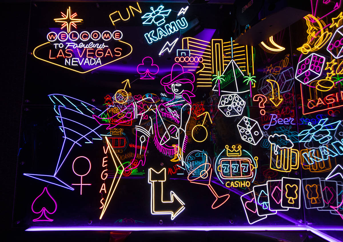 A room filled with neon signs at Kamu Karaoke at the Grand Canal Shoppes at The Venetian in Las ...