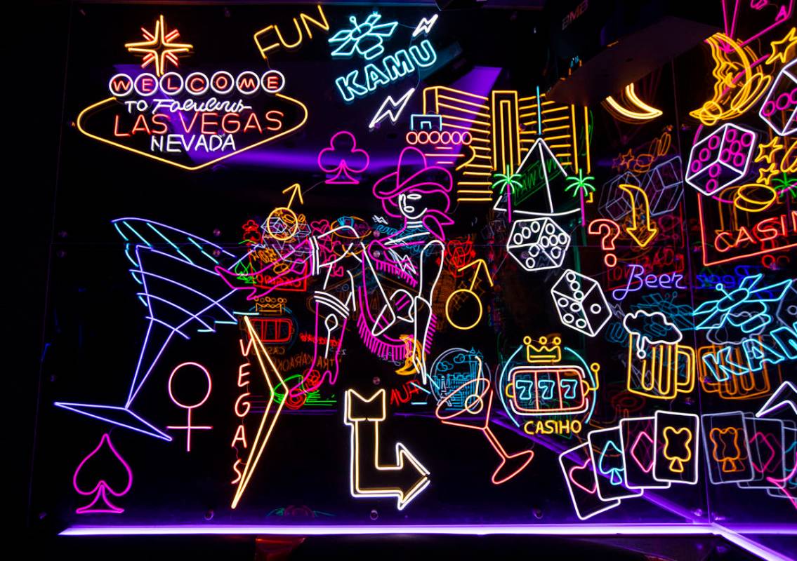 A room filled with neon signs at Kamu Karaoke at the Grand Canal Shoppes at The Venetian in Las ...
