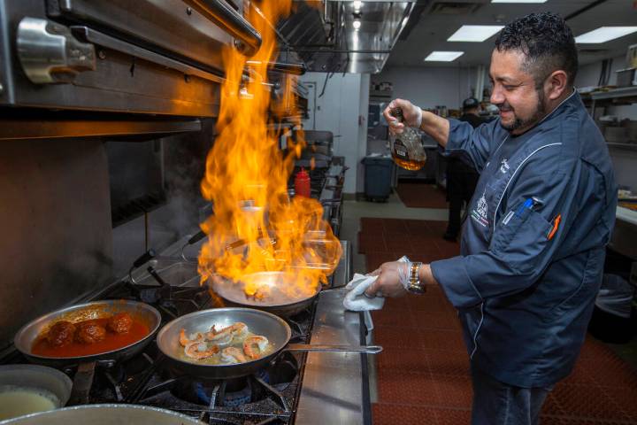 Il Toro Y La Capra executive chef Jose Martinez prepares Pasta al Cognac at the restaurant dedi ...