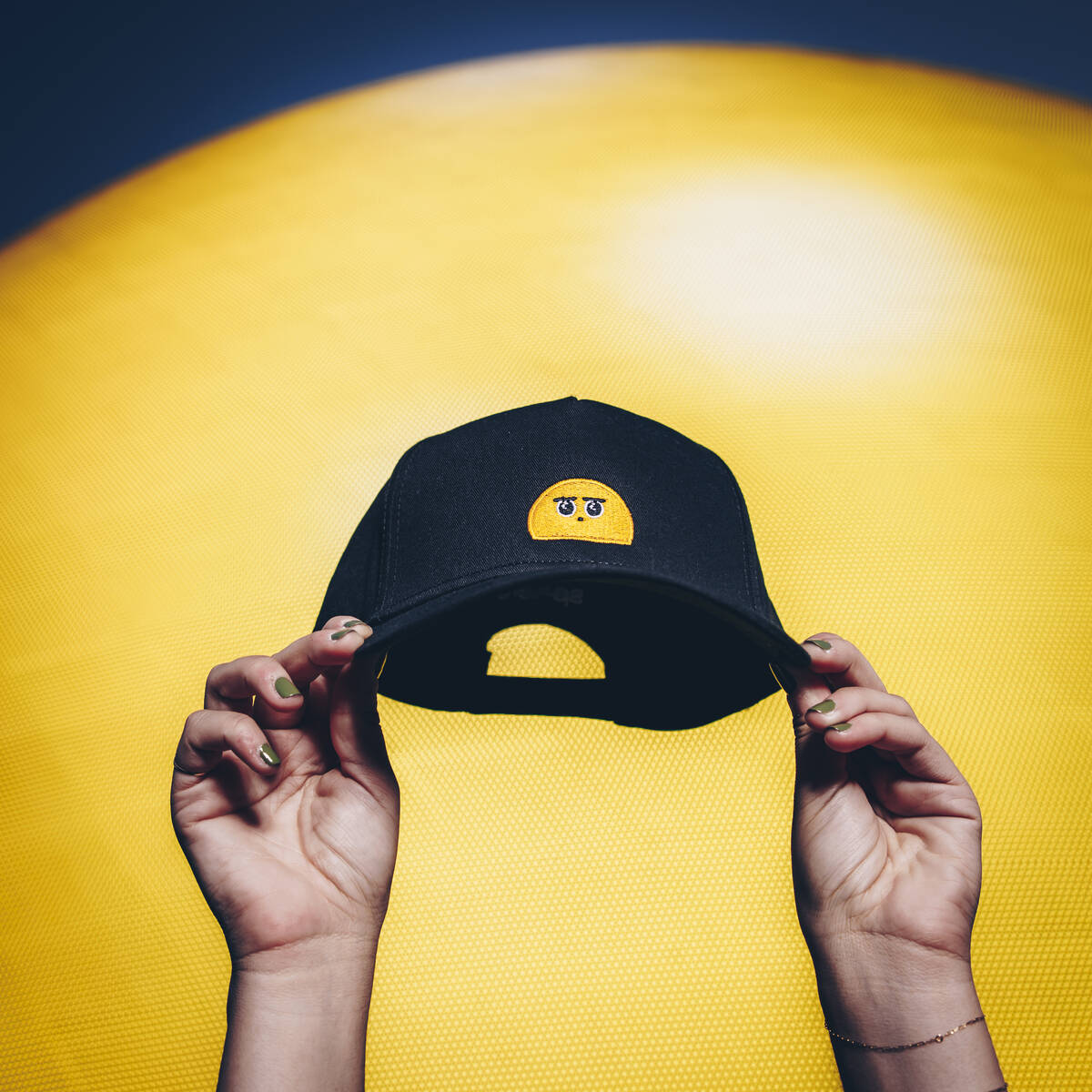 Sphere’s new e-commerce shop is selling merchandise featuring Orbi, the yellow emoji that&#82 ...