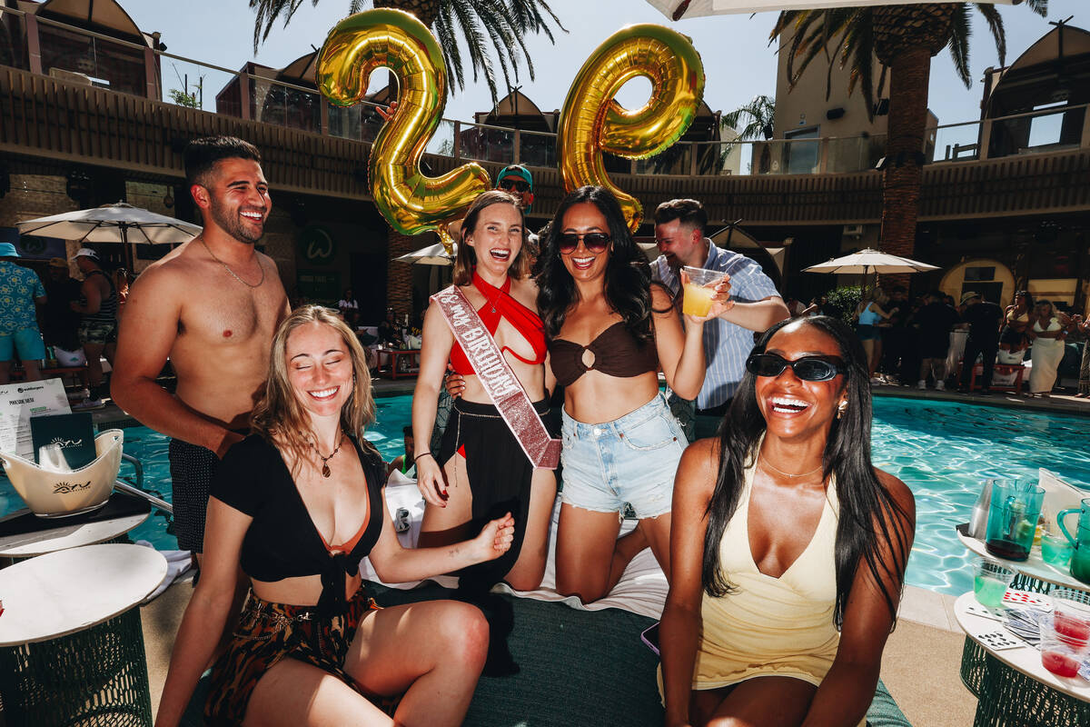 Club goers celebrate a birthday at AYU Dayclub at Resorts World Saturday, March 29, 2025, in La ...