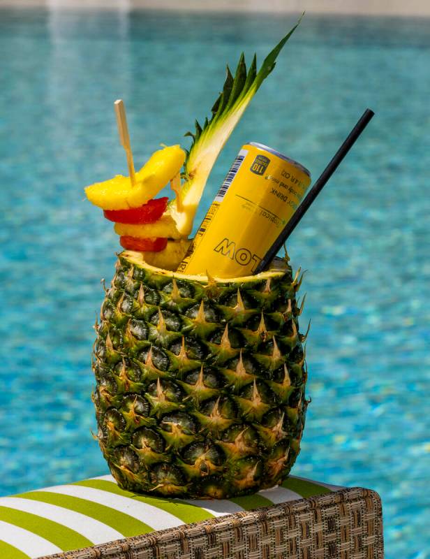 A Pineapple Mirage drink with Bacardi tropical, pandan, coconut, lime and red Bull yellow editi ...