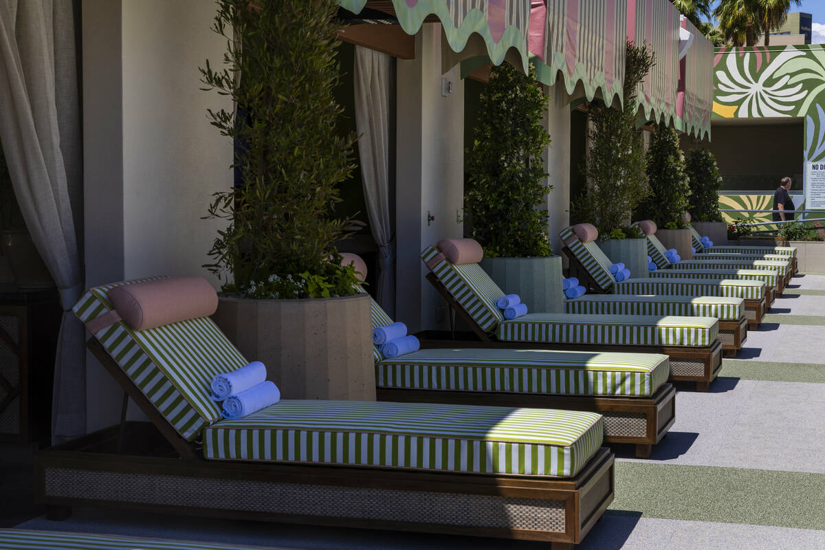 Lounges are ready for use outside each cabana at the new Palm Tree Beach Club at the MGM Grand ...