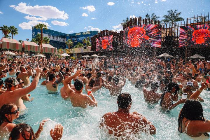 Partiers take to the pool at the Palm Tree Beach Club Saturday, May 10, 2025, in Las Vegas. (Ma ...