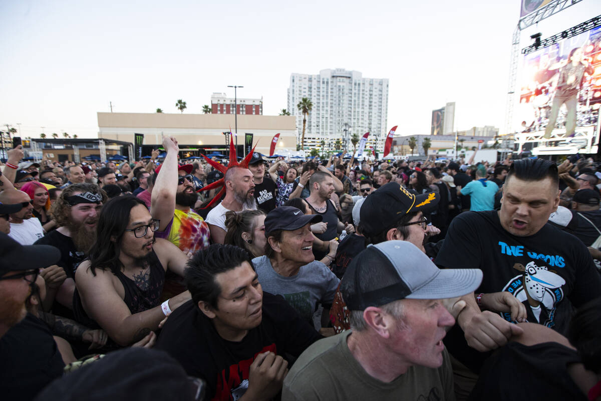 Fans mosh as The Interrupters perform during the Punk Rock Bowling music festival on Saturday, ...
