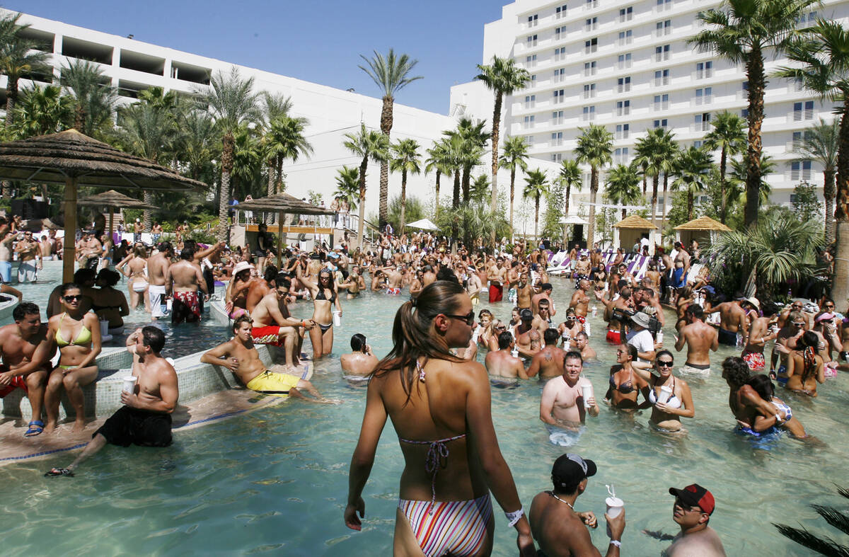 FILE*** LOCAL - Bodies pack the pool during the Sunday afternoon pool party "Rehab" a ...