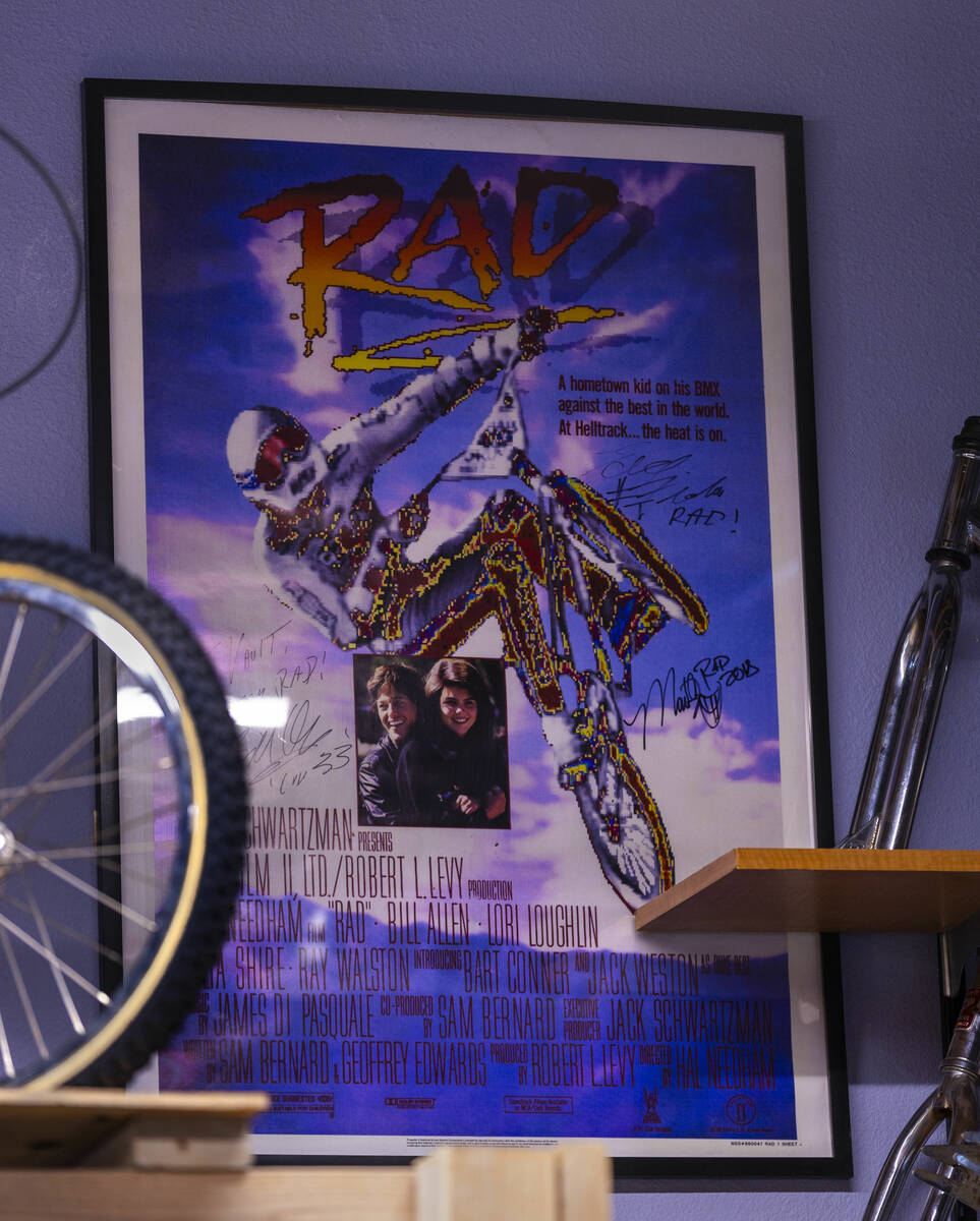 An autographed poster from the 1986 bicycle movie Rad hangs on the wall at the Vault Bicycle Sh ...