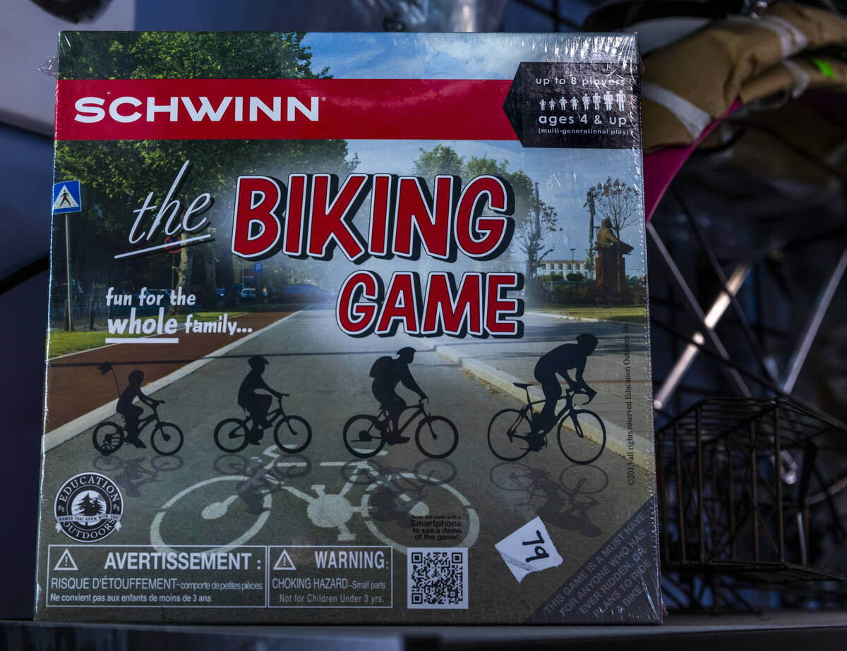 Even a classic game by Schwinn is on a shelf at the Vault Bicycle Shop which has a “Walk ...