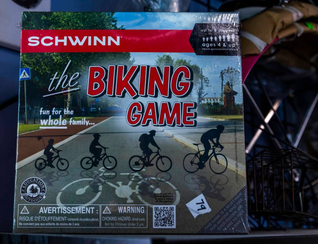 Even a classic game by Schwinn is on a shelf at the Vault Bicycle Shop which has a “Walk ...