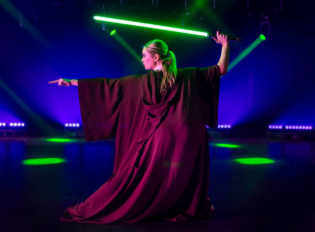 The Jedi from the burlesque Star Wars spoof “The Empire Strips Back” poses at the f ...