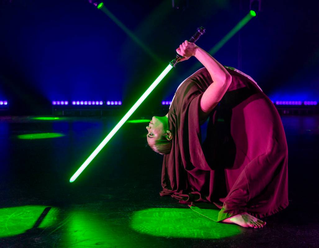 The Jedi from the burlesque Star Wars spoof “The Empire Strips Back” poses at the f ...