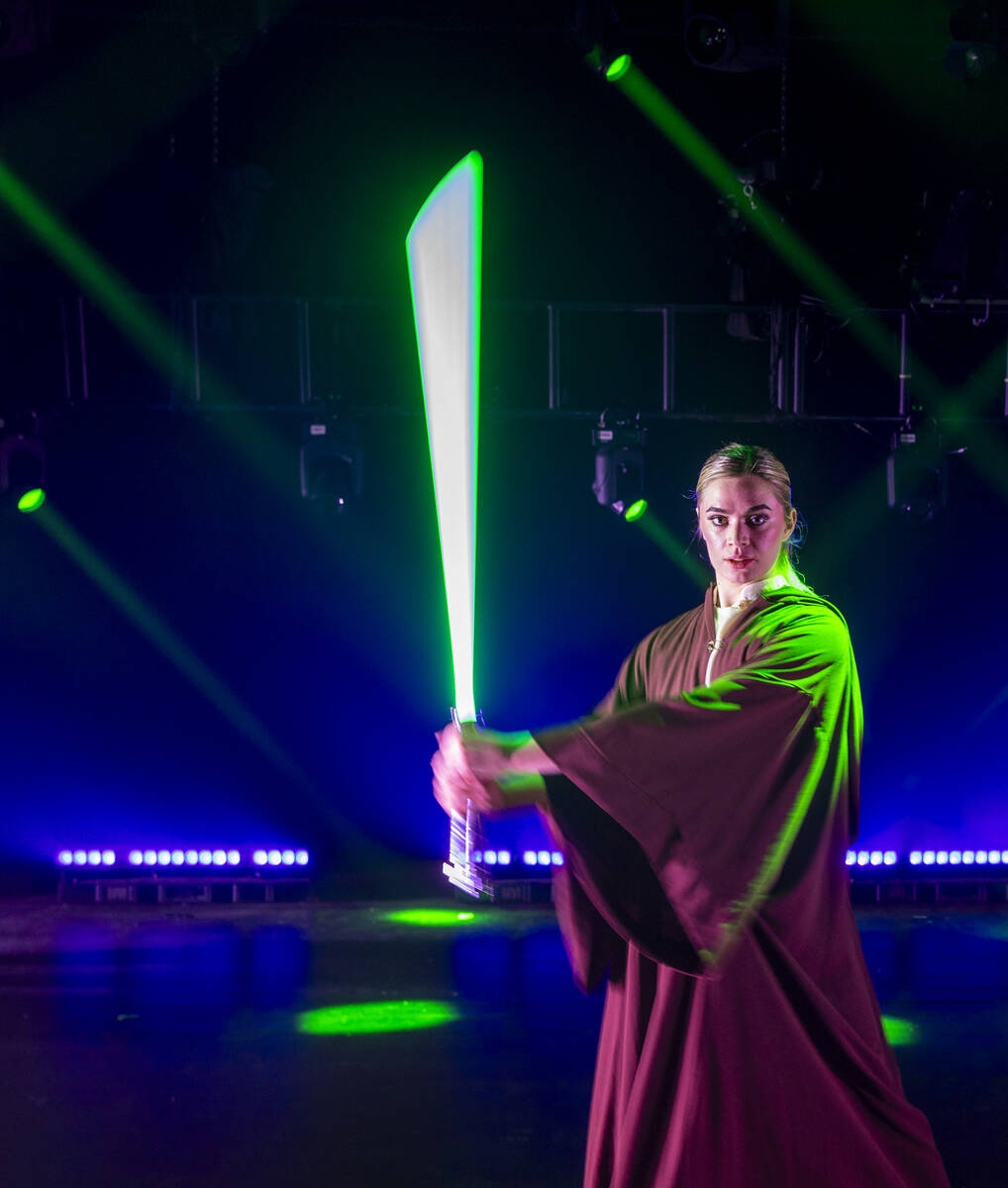 The Jedi from the burlesque Star Wars spoof “The Empire Strips Back” poses at the f ...