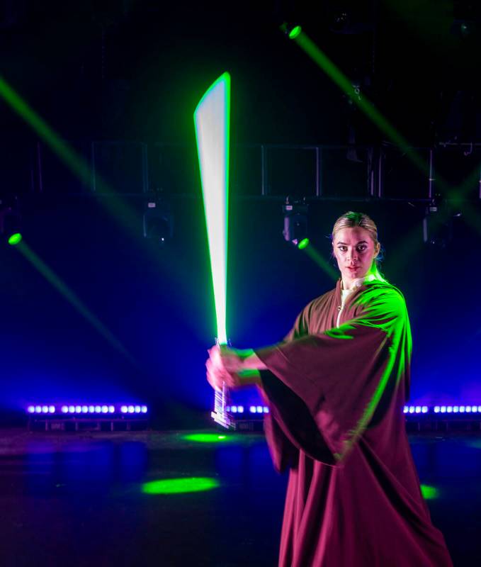 The Jedi from the burlesque Star Wars spoof “The Empire Strips Back” poses at the f ...