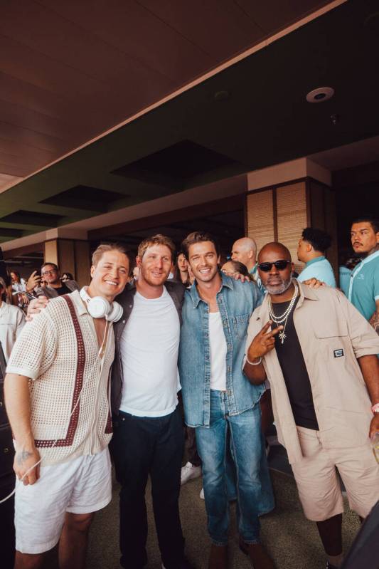 Kygo, Myles Shear, Patrick Schwarzenegger and Cory Cambles are shown at the opening of Palm Tre ...