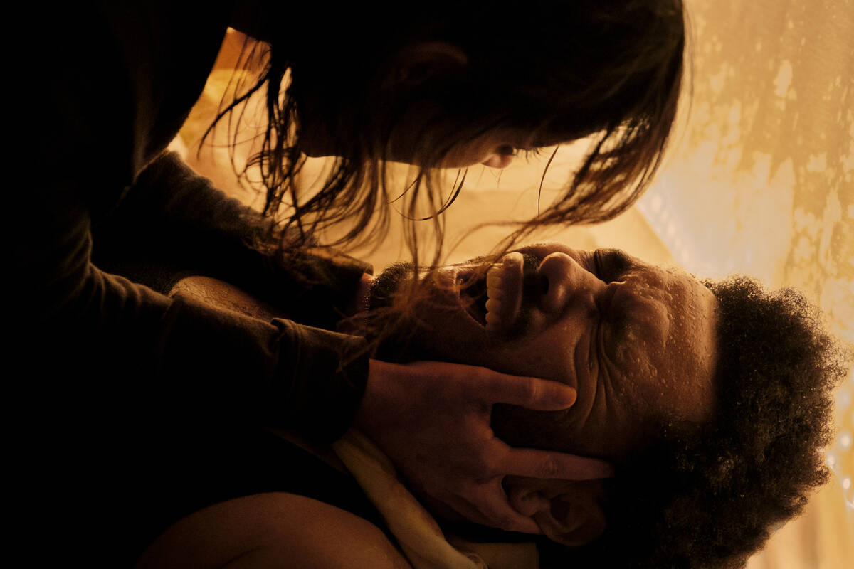 This image released by Lionsgate shows Jenna Ortega as Anima, top, and Abel "The Weeknd&qu ...