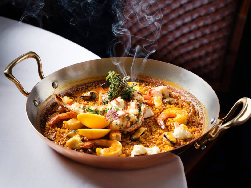 Paella from Pisces Bar & Seafare, a new seafood restaurant opening on May 10, 2025, on the ...
