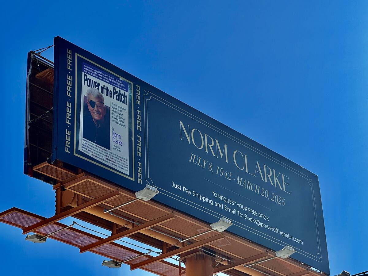 A billboard from Elite Media honoring the late Review-Journal columnist Norm Clarke is shown ab ...
