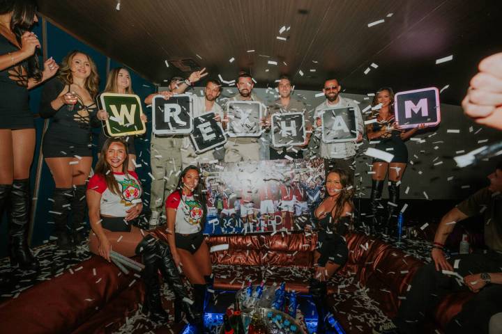 Members of Wrexham A.F.C. celebrate the team’s promotion to the English Football League C ...