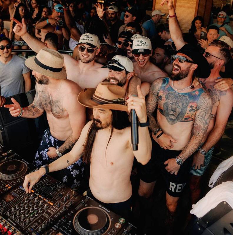 Members of the Wrexham A.F.C. soccer team appear with DJ Steve Aoki at Palm Tree Beach Club at ...