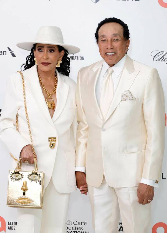 Frances Gladney, left, and Smokey Robinson attend the Elton John AIDS Foundation’s 32nd A ...