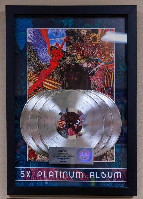 An RIAA 5X Platinum Certification for the album Abraxas on the wall of Carlos Santana’s o ...