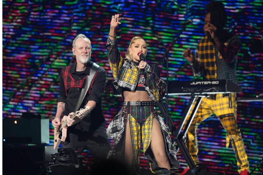 Tom Dumont, left, and Gwen Stefani of No Doubt perform during the FireAid benefit concert on Th ...