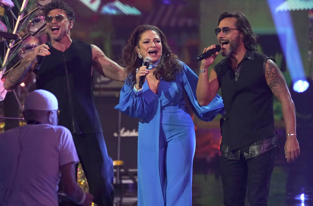 Pedro Capo, from left, Gloria Estefan and Diego Torres perform a medley at the 22nd annual Lati ...
