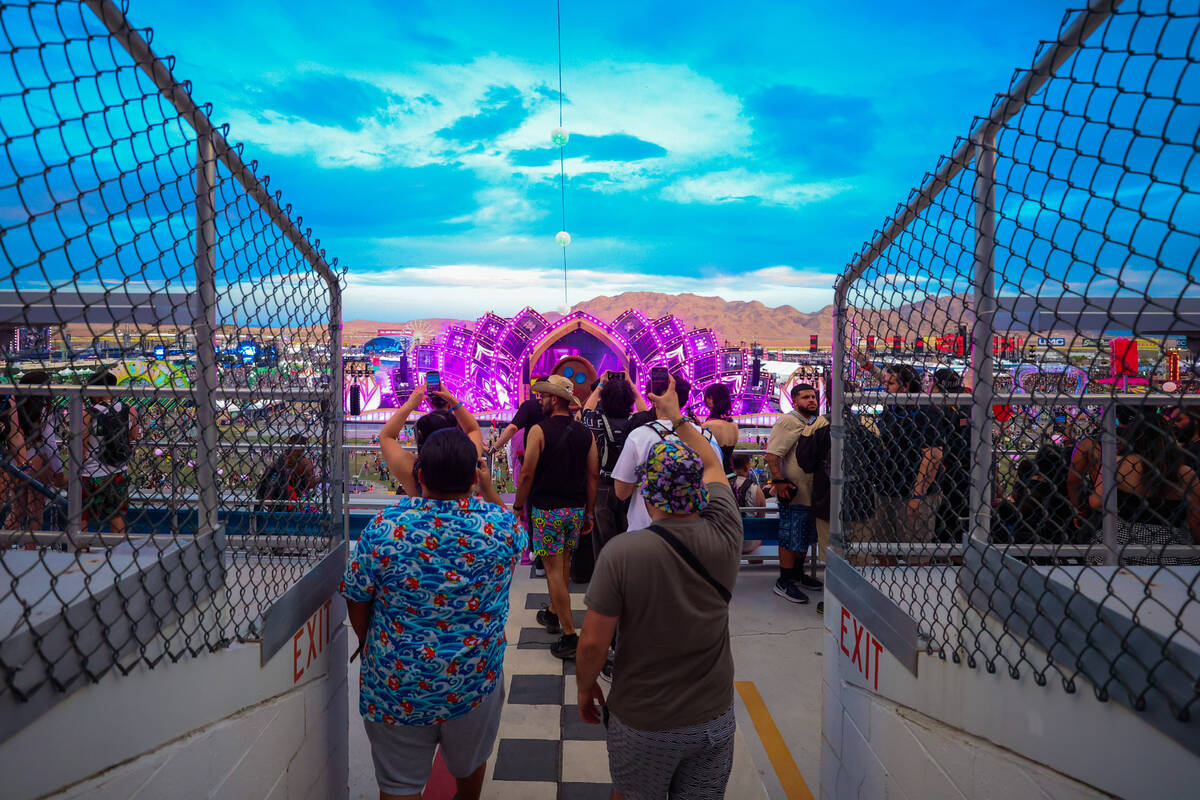Festival attendees walk out to the festival during day one of the Electric Daisy Carnival at th ...