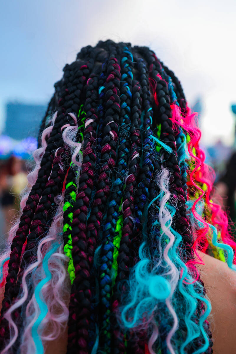 A festival goer wears colorful braids during day one of the Electric Daisy Carnival festival at ...