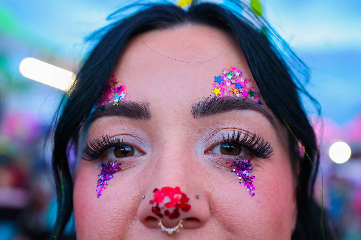 Aly Bates wears clown makeup during day one of the Electric Daisy Carnival festival at the Las ...