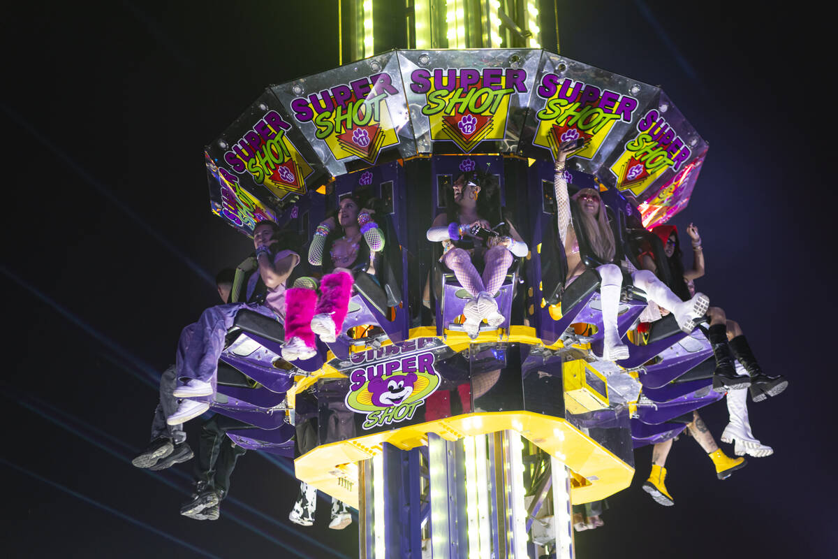 Attendees go on a carnival ride during the second night of the Electric Daisy Carnival at Las V ...